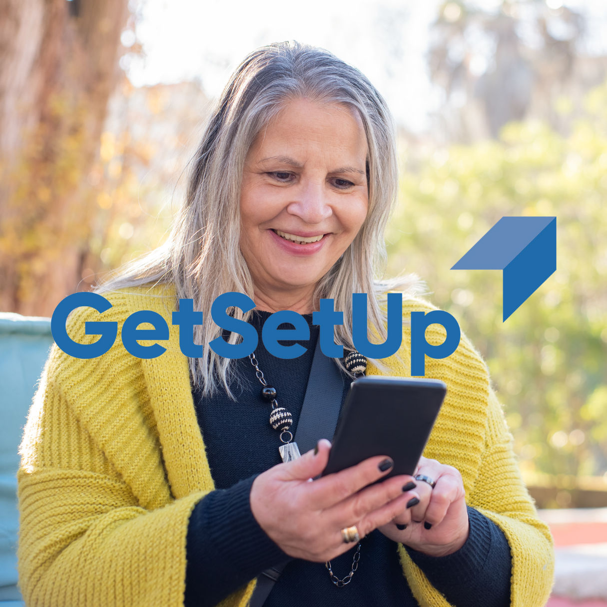 image of a woman using a cell phone with getsetup logo
