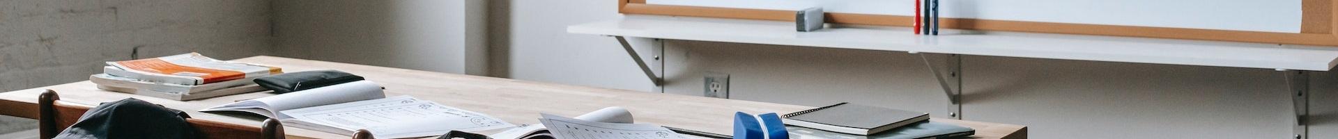 image of a desk and whiteboard